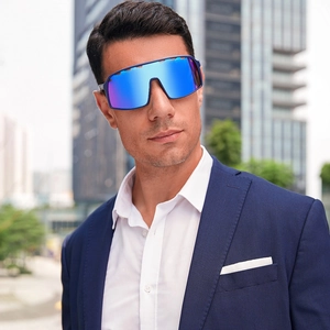 Detail of blue polarized lens with top ventilation holes on sports cycling sunglasses