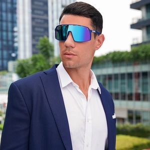 Detail of cycling sunglasses with blue-purple lenses and upper frame cooling vents