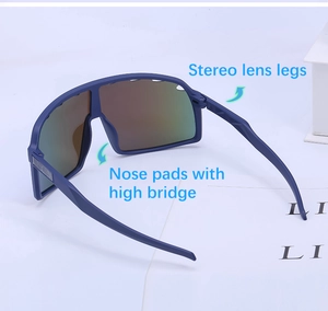Detail of blue matte sports sunglasses showing stereo lens legs and high bridge nose pads
