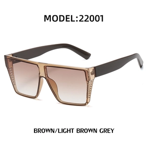 Oversized square sunglasses with gradient brown lenses and transparent tea frames