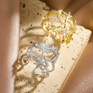 Funkelnde sternförmige verstellbare Ringe in Gold und Silber mit Pavé-Strasssteinen