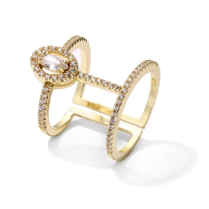 Bague double croisée dorée avec zircon marquise et serti pavé élégant