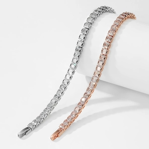 Silver and rose gold tennis bracelet set with square-cut cubic zirconia and safety clasp