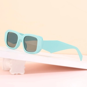 Fashionable thick frame square sunglasses in mint green with wide temples and grey lenses