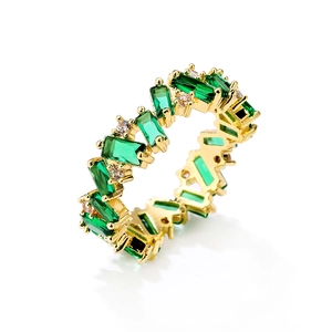 Gold-plated ring for women featuring rectangular green zircons and sparkling clear accents