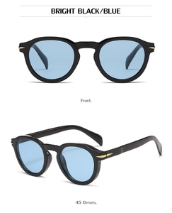 Retro round black sunglasses with blue lenses and gold arrow metal accents on the frame