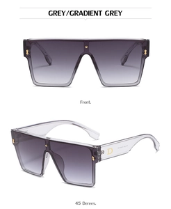 Detailed views of oversized flat top sunglasses with gradient lenses and gold D-logo