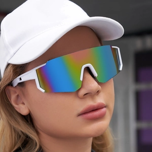 White sports cycling sunglasses with colorful mirrored lenses worn by a model on the street
