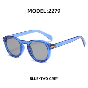 Retro round blue translucent sunglasses with grey lenses and model 2279 detailing