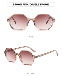 Detail view of octagon geometric sunglasses with gradient brown lenses in light tea frames