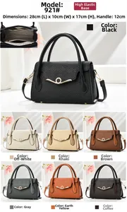 Internal compartments of the woven texture leather handbag with zipper pocket detail