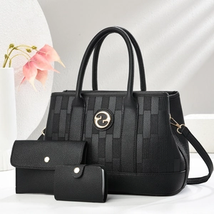 Three-piece black litchi textured leather tote bag set with gold logo and shoulder strap