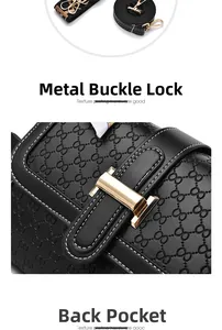 Detail view of black embossed leather bag showing gold hardware and two strap styles