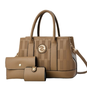 Three-piece brown embossed leather handbag set with tote bag, wallet and card holder