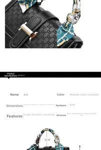 Detail view of black embossed tote bag with geometric silk scarf handle and gold hardware