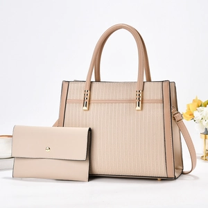 Striped geometric tote bag and matching clutch set in beige with golden hardware