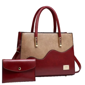 Minimalist striped tote bag set with metal rivets and matching pouch in deep red and khaki