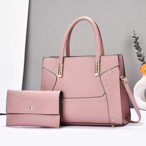 Pink striped tote bag set with studs including a matching handbag and crossbody wallet