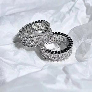 Macro detail of silver eternity rings with multi-layer pave-set cubic zirconia stones