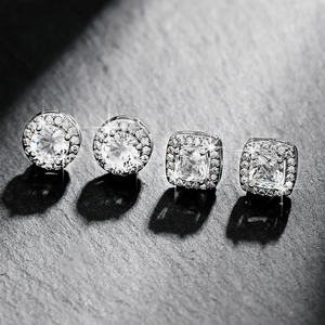 Sparkling square and round cubic zirconia stud earrings set in silver finish