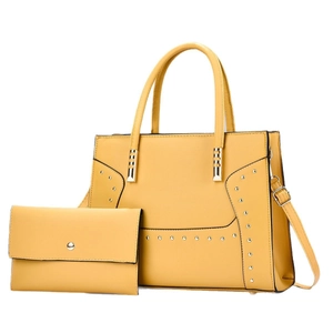 Bright yellow tote bag and matching wallet set with silver rivets and top handles