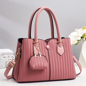 Rosa plissierte Handtasche mit Henkeln, Schultergurt und Mini-Geldbörsen-Anhänger-Zubehör