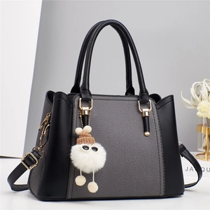 Damen Handtasche PU Leder Kontrastfarben Große Kapazität Schultertasche Umhängetasche Mit Plüschpuppen Anhänger