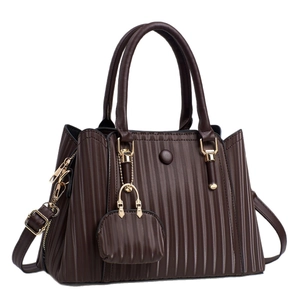 Dark brown pleated PU leather tote bag with gold hardware and mini bag charm