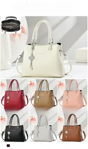 Detailed size specifications and inner compartment view of the lychee texture handbag