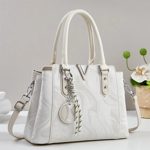 Chic cream white marbled handbag with silver V-hardware and versatile crossbody strap