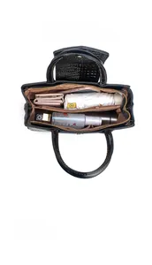 Interior view showing large capacity compartments with organizer for everyday essentials