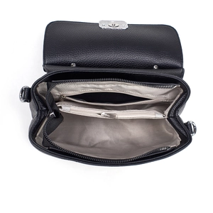 Interior view of black pebble leather shoulder bag with multiple compartments and silver clasp