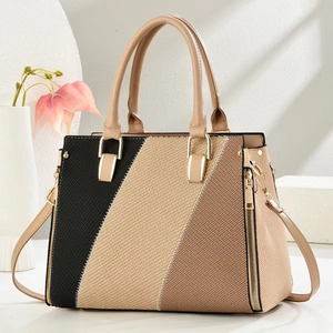 Contrast color patchwork handbag with black and beige panels and stylish top handles