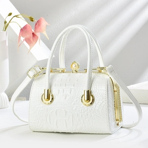 White faux crocodile leather handbag with pearl diamond clasp and adjustable shoulder strap