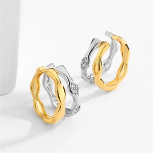 French design two-tone wave hoop earrings with sparkling cubic zirconia in gold and silver
