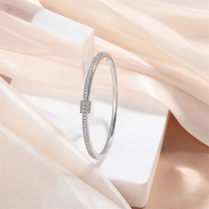 Bracelet Jonc En Laiton Avec Micro Pavé De Zircone Cubique Design Nœud Bijoux De Mode Minimalistes Pour Femmes