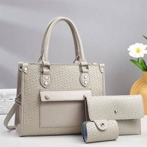 Beige 3-piece bag set with woven embossed tote, clutch, and round coin purse for women