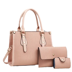Pink three-piece pleated faux leather tote bag set with matching envelope clutch and card holder