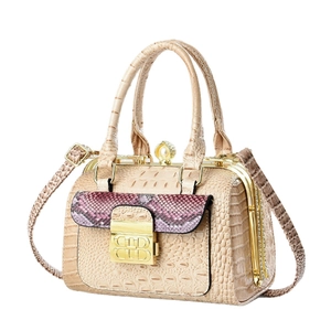 Beige crocodile embossed handbag with purple snake pattern and pearl metal clasp