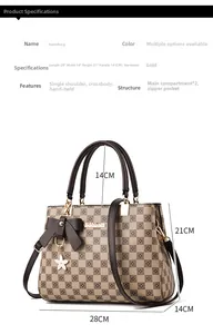 Detail of checkered handbag with bow charm and dual main compartments interior structure