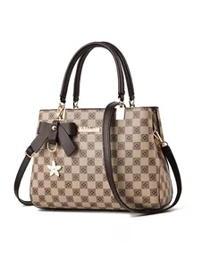 Detailed side view of checkerboard handbag with bow charm and gold logo emblem