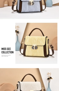 Detailed view of tricolor patchwork bag with pleated flap and metal G-shaped clasp