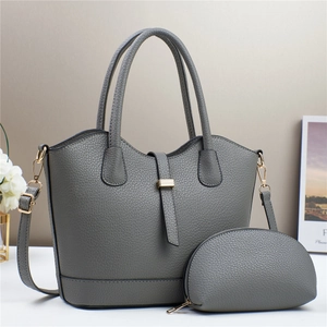 Litchi pattern faux leather handbag set with shoulder strap and clutch in grey