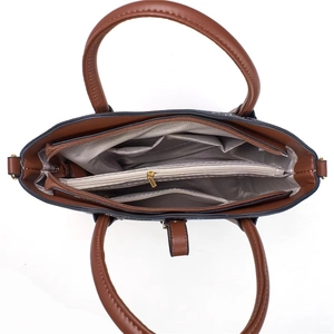 Interior view of large capacity tote showing multi-compartment dividers and zipper pocket