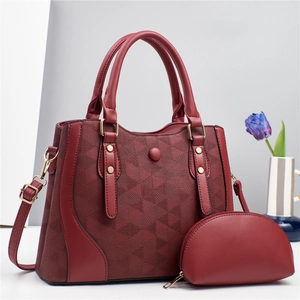 Elegant wine red tote bag set with geometric diamond pattern and gold hardware accents