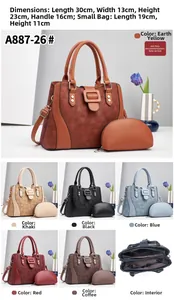 Detail view of large diamond texture tote bag and matching crescent pouch in various colors