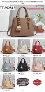 Detailed view of striped handbag with multi-layer compartments and eight color options