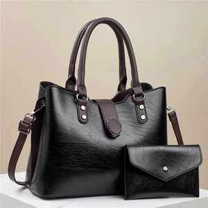 Black and dark brown textured leather tote bag set with matching envelope wallet