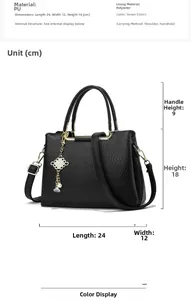 Detailed view of black lychee grain tote bag showing dimensions and pearl knot pendant