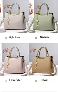 Litchi texture tote bags in light grey, green, purple, and khaki with pearl pendants